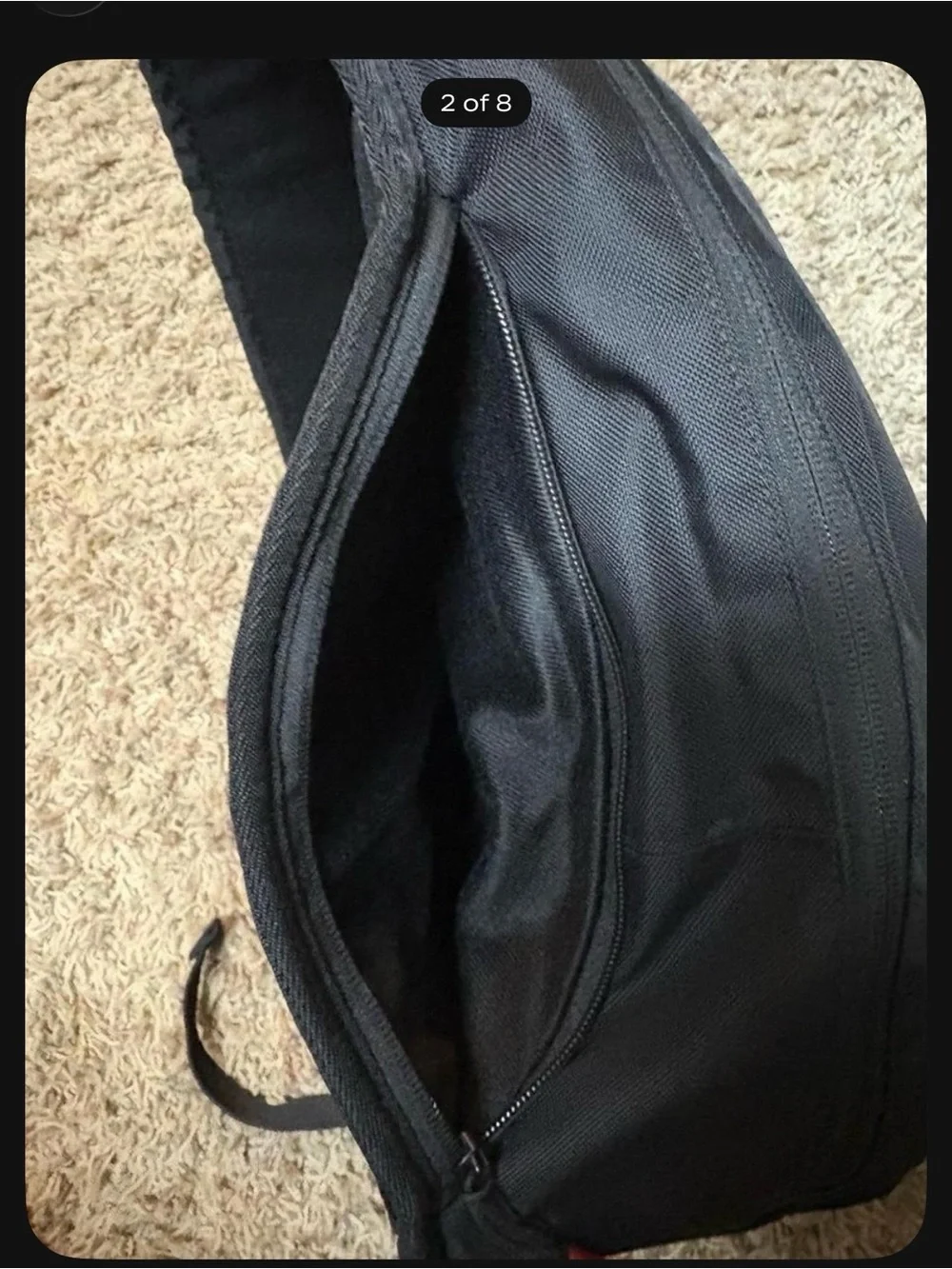 Sherpani Black Sling Bag with Red Accents